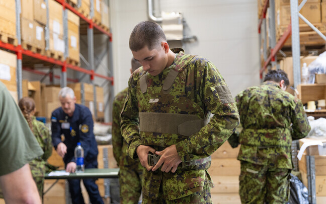 New conscripts receiving their gear.