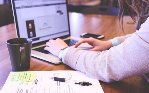 A student on a computer.